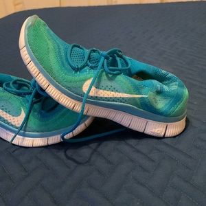 Teal and light blue Nikes